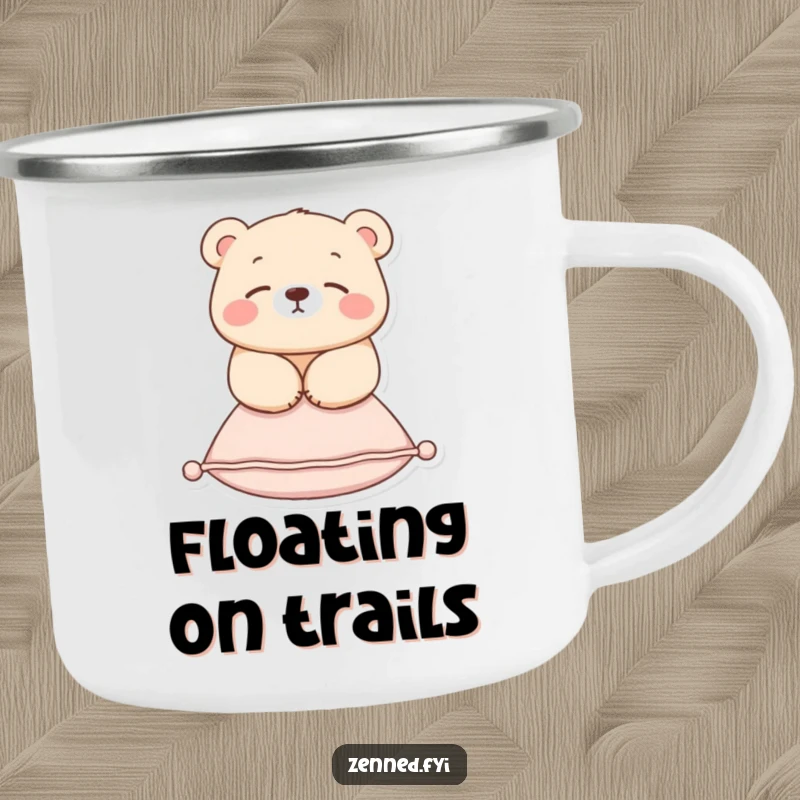 Funny camping mug featuring a serene bear floating above a cushion, perfect for enjoying drinks outdoors with peaceful humor.