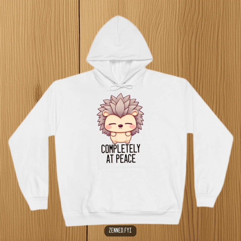 Funny hoodie featuring a peaceful hedgehog character with eyes closed, embodying ultimate calm and comforting humor.