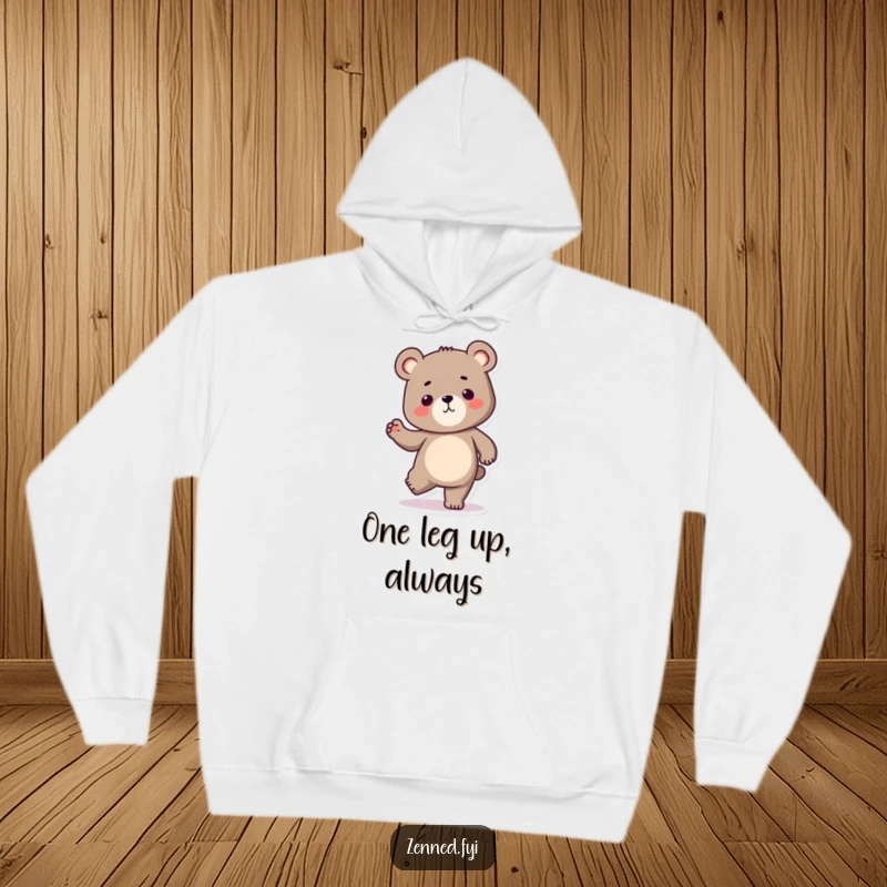 Funny Kawaii bear hoodie with a determined character balancing on one leg, offering warmth and a humorous symbol of strength, a great gift.