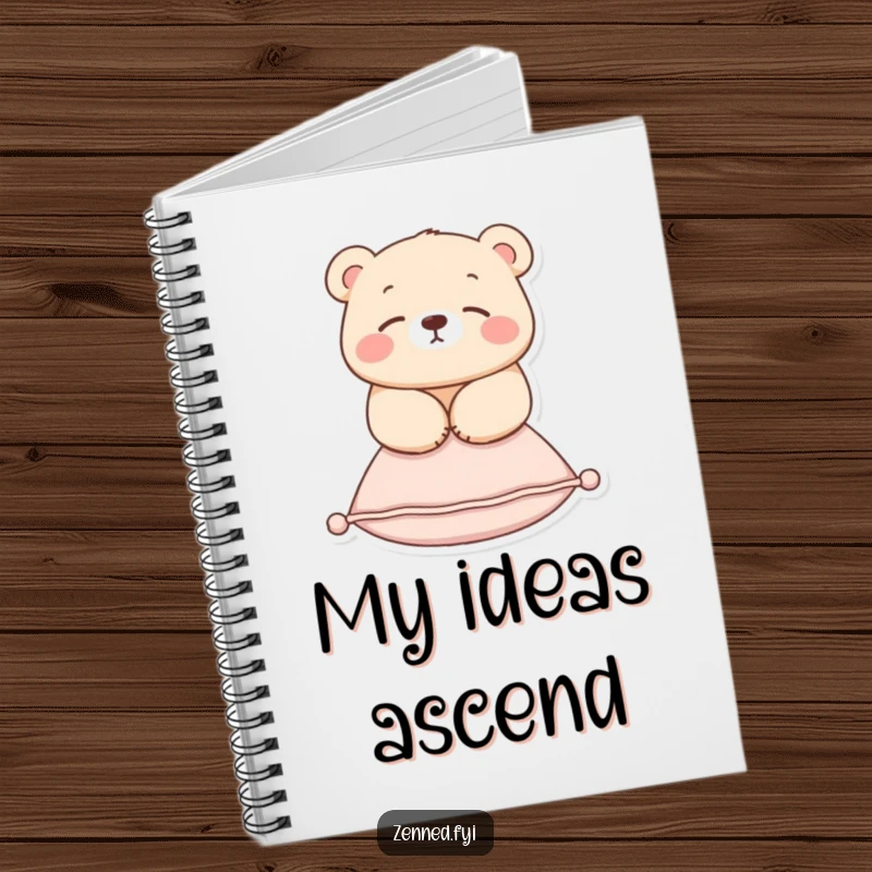 Funny notebook with a serene bear floating above a cushion, designed for calm note-taking and inspiring peaceful thoughts.